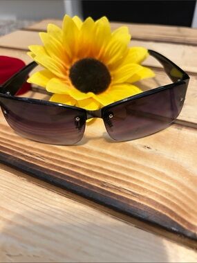 Sleek Black Rimless Sunglasses